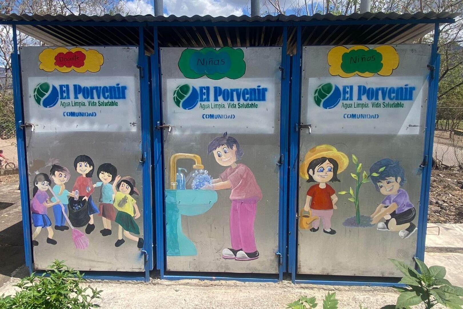 school latrine block with hygiene mural
