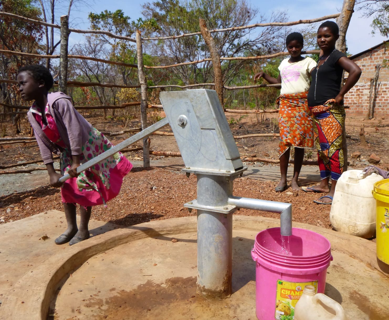 children with water pump