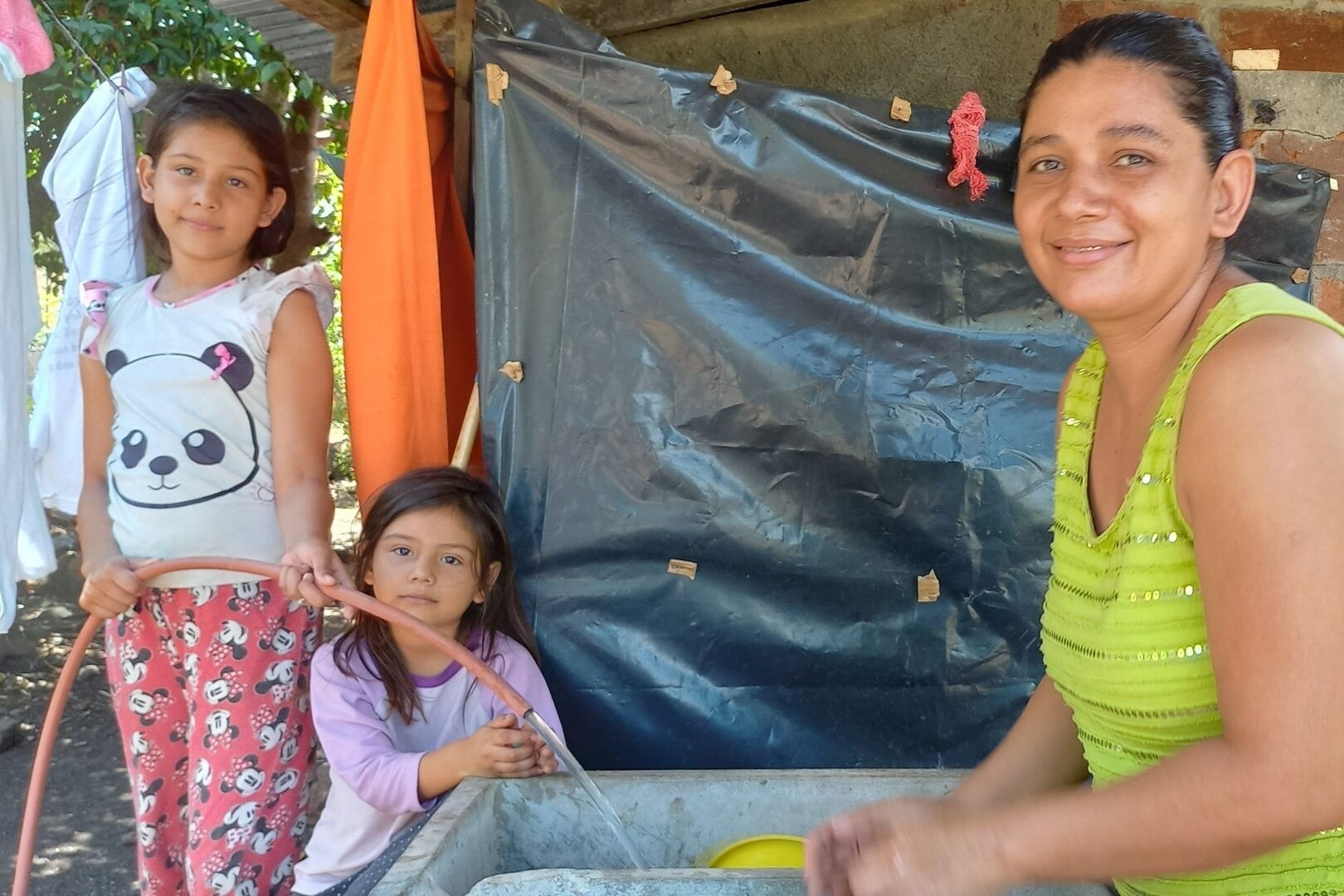 family running clean water tap