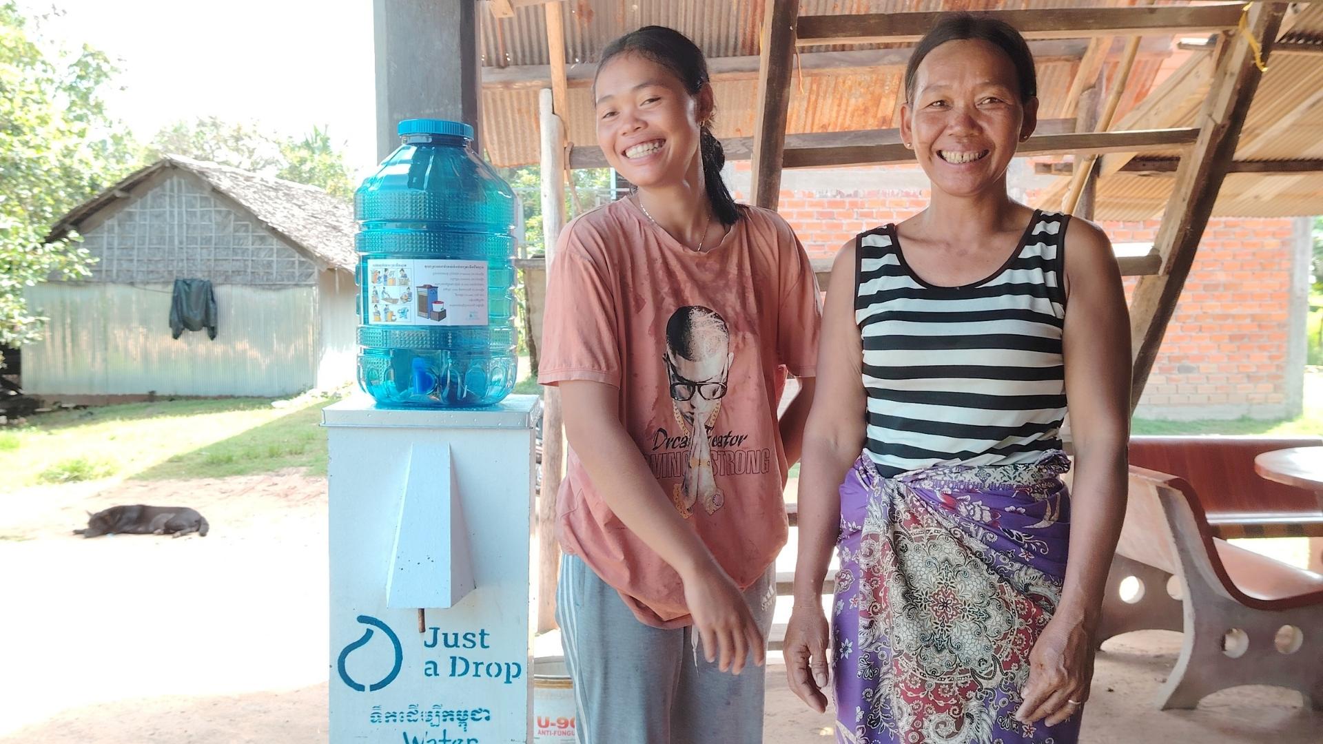 mother and daughter with biosand filter