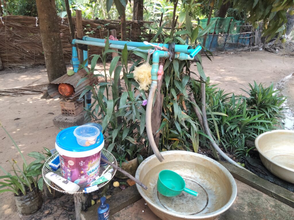 Two pipes lead into an empty bowl